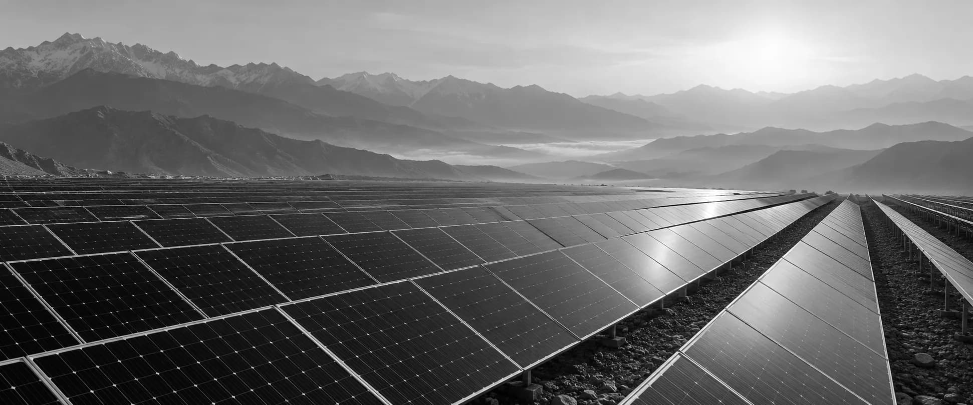 Illustrative solar-panel landscape with silver mountain silhouettes and soft morning light